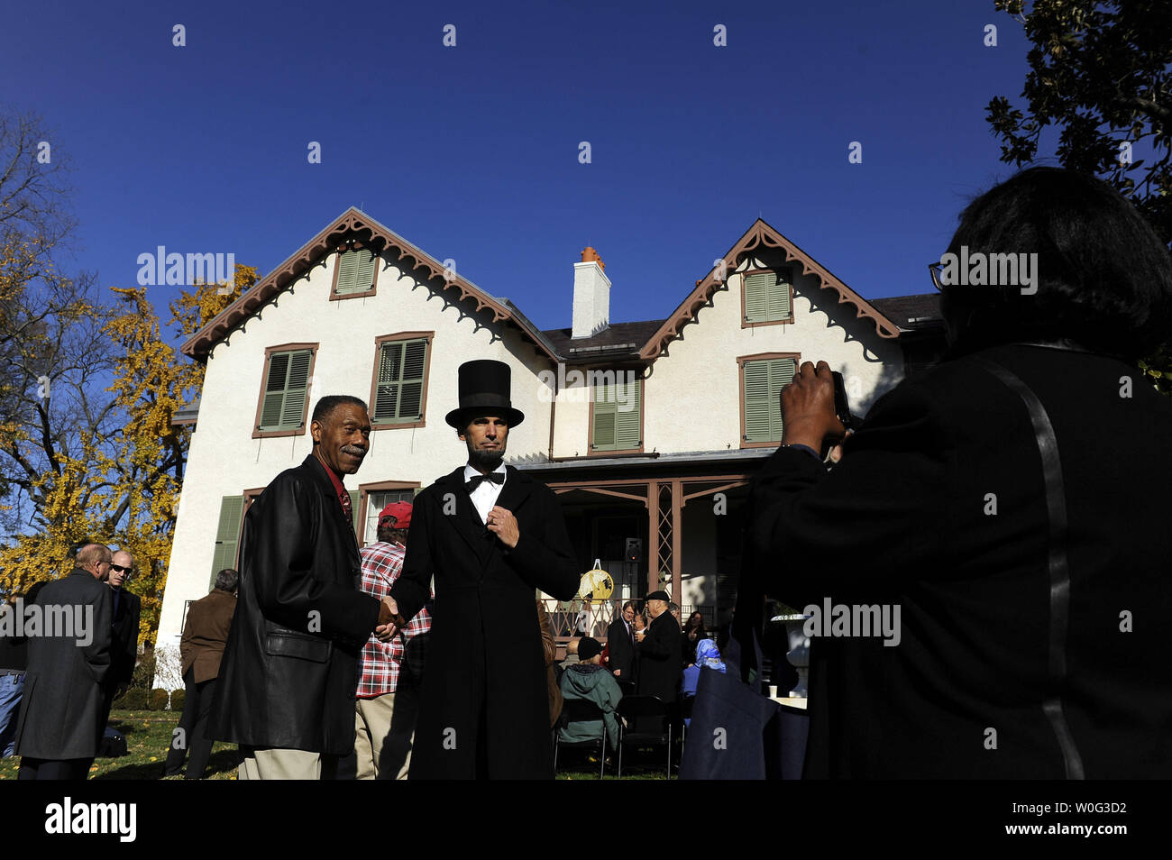 Dan Storck Dressed As President Lincoln Poses With Guests Before
