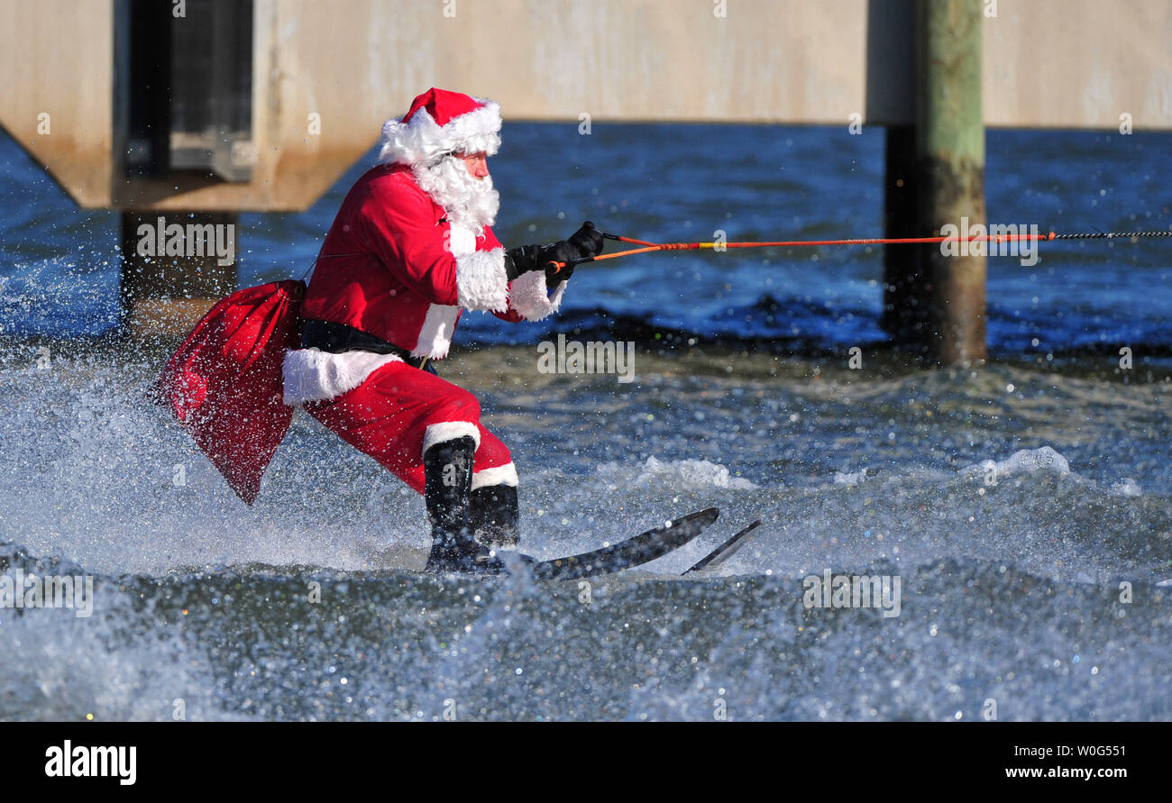 A performer dressed as Santa Clause performs during the 25th annual Water-Skiing Santa show on the Potomac River at the National Harbor in Maryland on December 24, 2010.  UPI/Kevin Dietsch Stock Photo