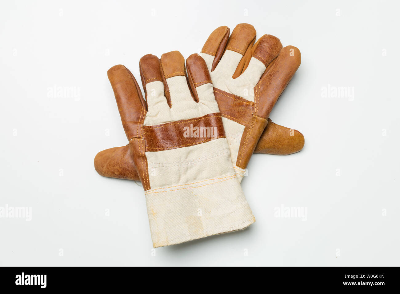 Working mens gloves isolated on white background Stock Photo