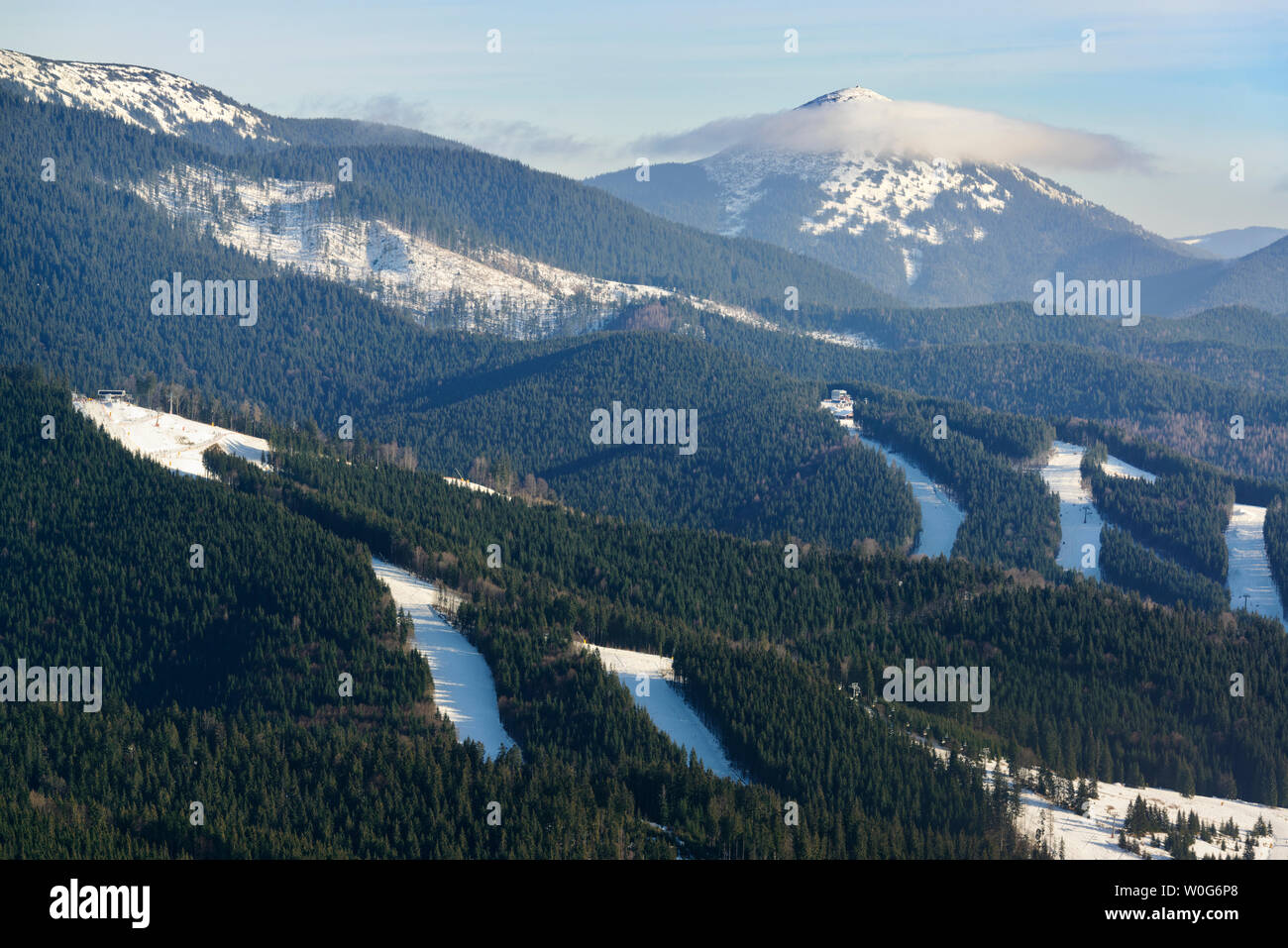 Mountain winter landscape with skiing resort slopes Stock Photo - Alamy