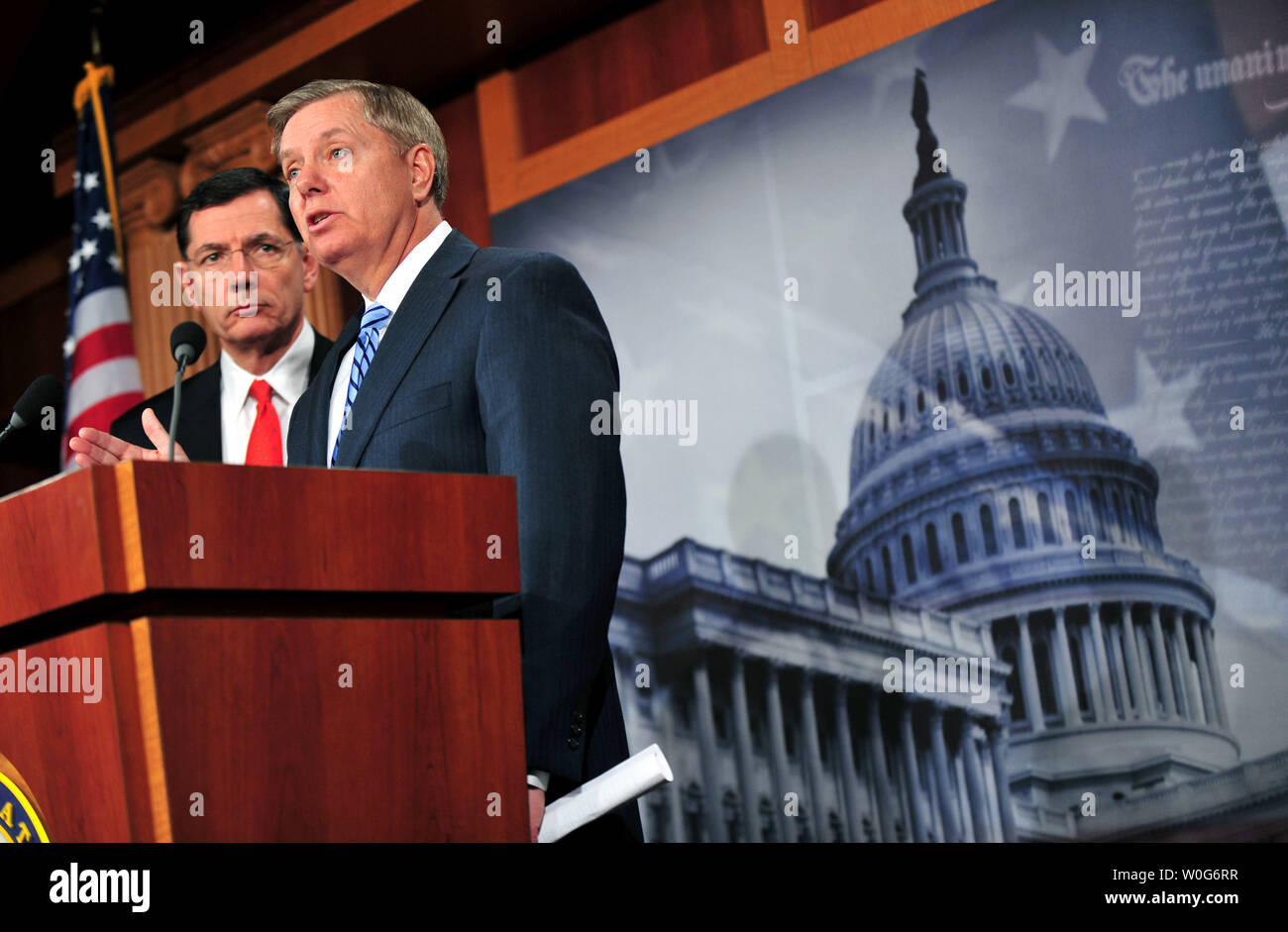 Sen. Lindsey Graham (R-SC) and Sen. John Barrasso (R-WY) speak at a news conference on legislation to repeal and replace the health care law by allowing states to 'Opt-Out' of its major provisions, Capitol Hill in Washington on February 1, 2011.  UPI/Kevin Dietsch.. Stock Photo