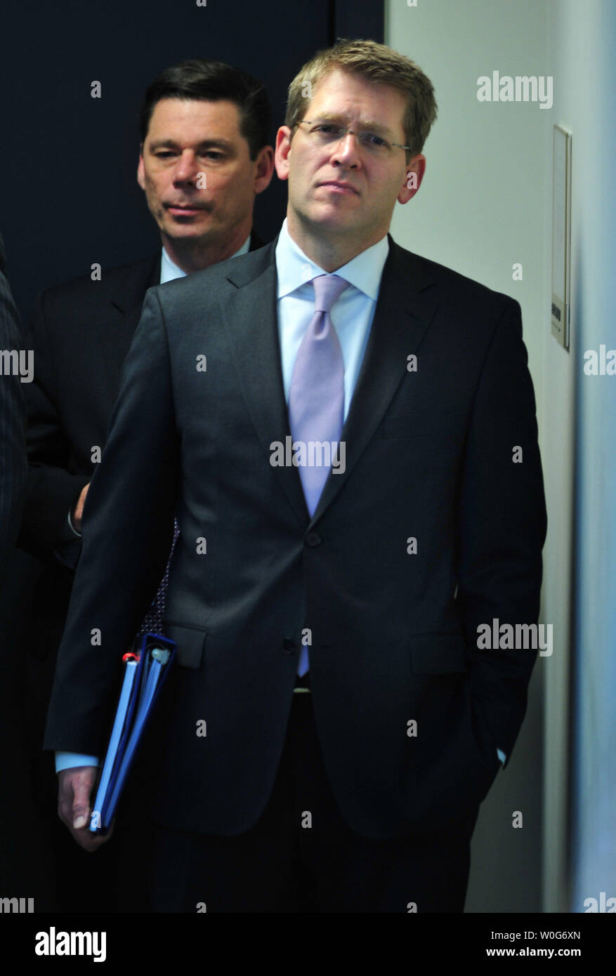 Incoming White House Press Secretary Jay Carney listens as President ...