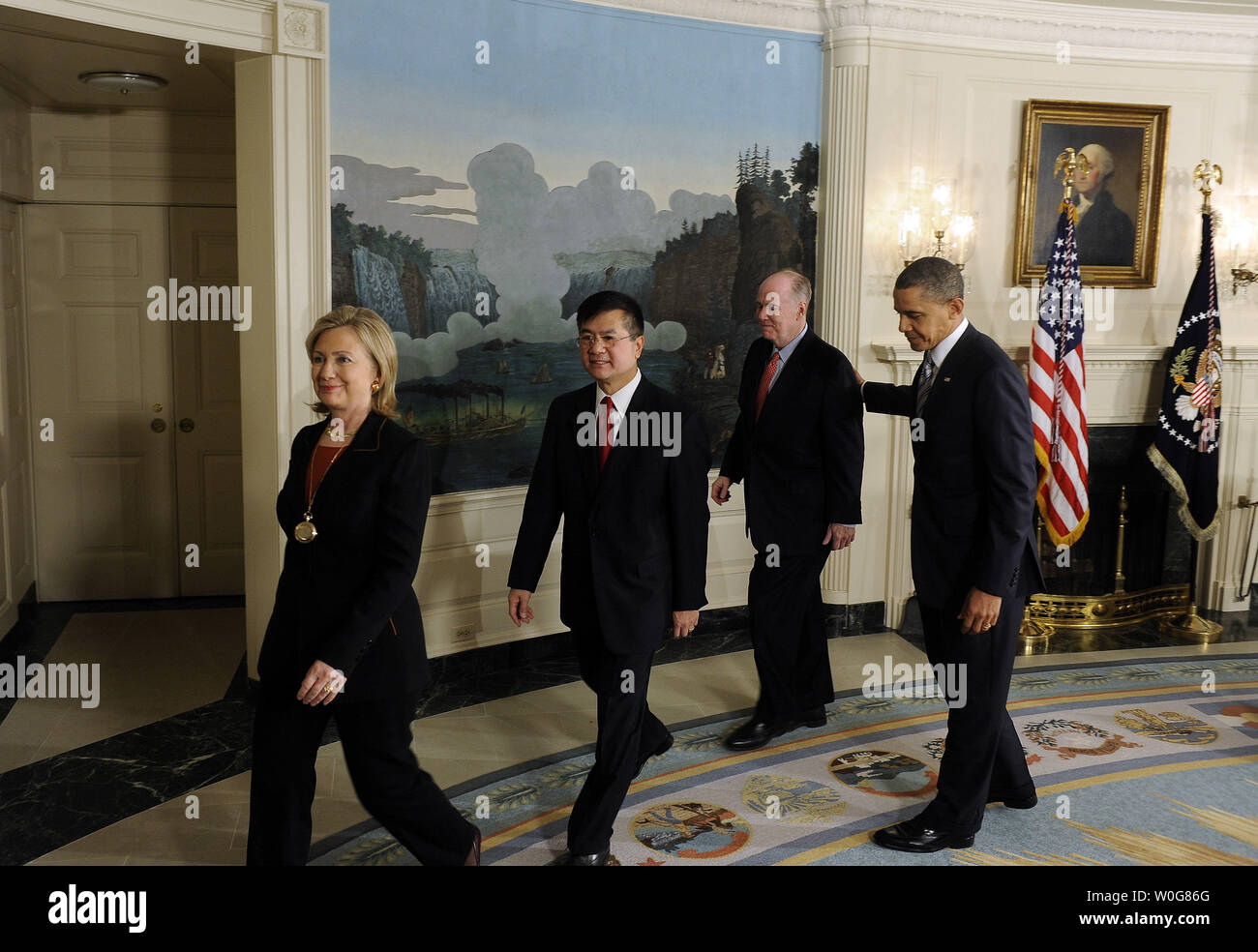 Secretary of State Hillary Rodham Clinton, Secretary of Commerce Gary F. Locke, National Security Advisor Tom Donilon (L to R) and U.S. President Barack Obama depart after Obama named Locke as his choice as Ambassador to China in the Diplomatic Reception Room of the White House in Washington on March 9, 2011.    UPI/Roger L. Wollenberg. Stock Photo