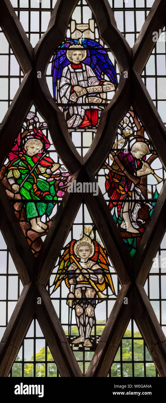 Gloria in Excelsis Deo by Christopher Whall (1902), Brockhampton-by-Ross Church, Herefordshire, UK Stock Photo