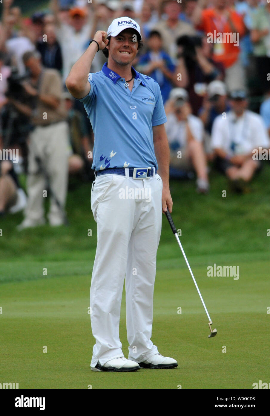Northern Ireland's Rory McIlroy smiles and jubilates after making his final putt and winning the 2011 U.S. Open golf championship at Congressional Country Club in Bethesda, Maryland on June 19, 2011.  McIlroy set a record in winning with a 16-under-par score.     UPI/Pat Benic Stock Photo