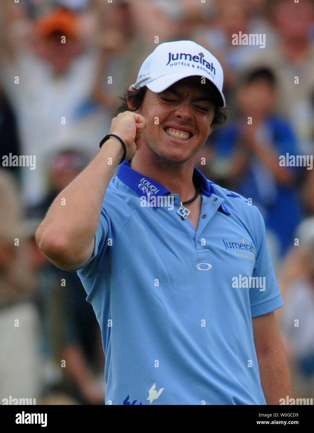 Northern Ireland's Rory McIlroy smiles and jubilates after making his final putt and winning the 2011 U.S. Open golf championship at Congressional Country Club in Bethesda, Maryland on June 19, 2011.  McIlroy set a record in winning with a 16-under-par score.     UPI/Pat Benic Stock Photo