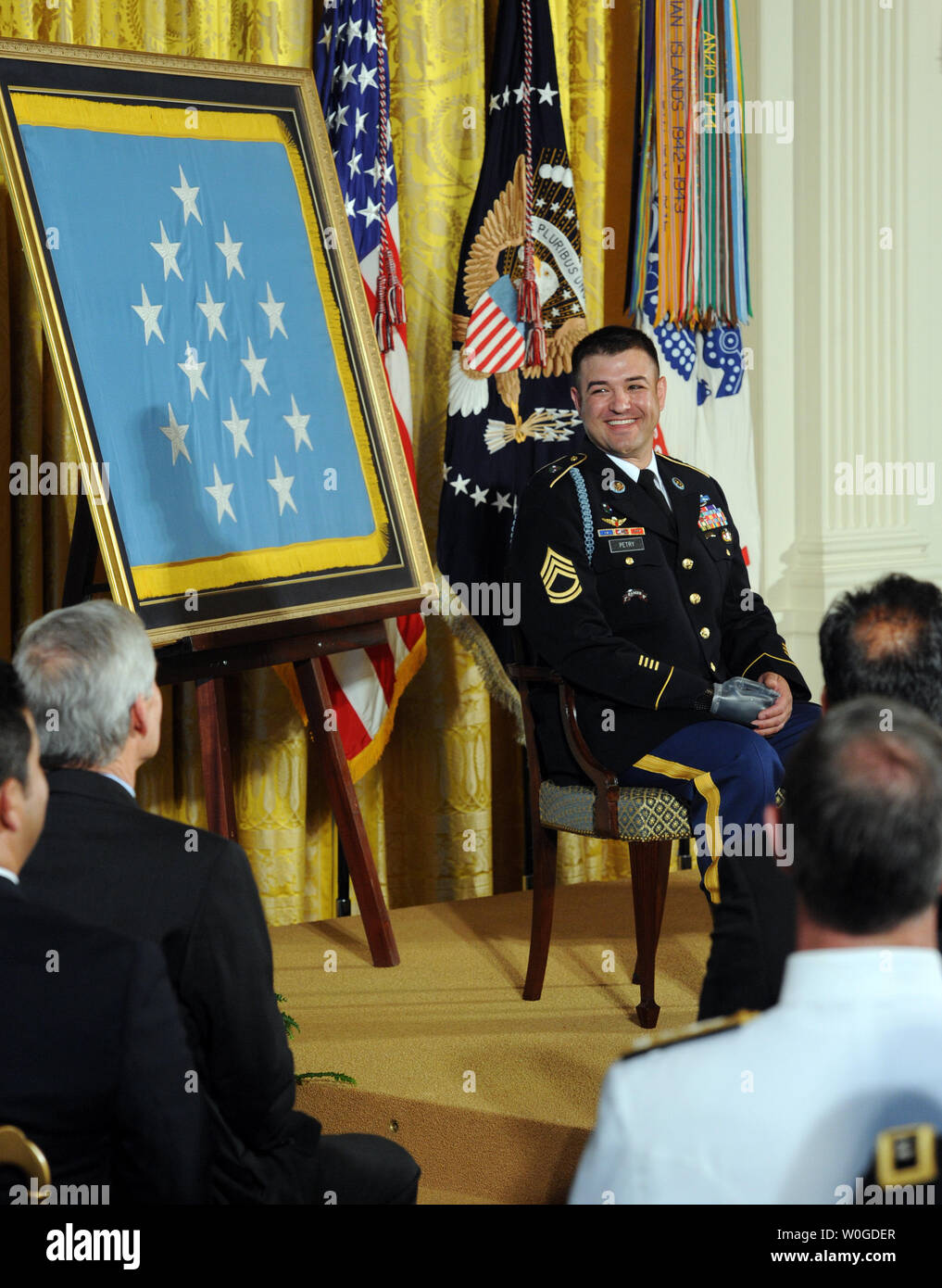 Sergeant First Class Leroy Arthur Petry, U.S. Army, waits to receive his  Medal of Honor from U.S. President Barack Obama for his heroic actions in  Afghanistan in May, 2008, during a ceremony