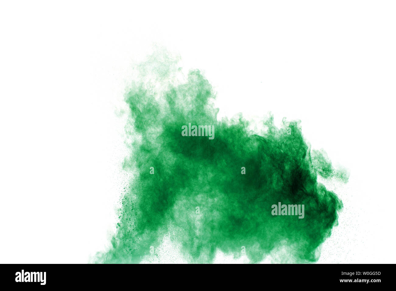 Green color powder explosion cloud on white background. Green dust