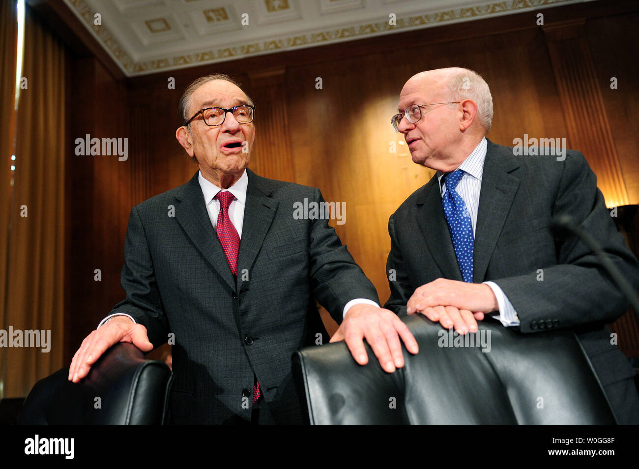 Former Federal Reserve Board Chairman Alan Greenspan (L) talks to Martin Feldstein, professor of economics at Harvard University, prior to a Senate Finance Committee hearing on tax reform and U.S. fiscal policy Washington on September 13, 2011.  UPI/Kevin Dietsch Stock Photo