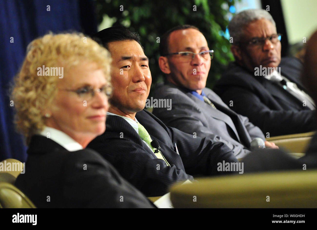 From left to right, Rev. Ruth Graham; Dr. Hyun Jin Moon, Founder and Chairman of the Global Peace Festival Foundation; Rev. Paul Murray, President of the Vision Ministries International; and Rev. E. W. Lee, Senior Pastor at Shiloh Baptist Church, McDonough, Georgia, participates in a forum discussion on faith leadership for American renewal at the National Faith Leaders Summit in Crystal City, Virginia on October 12, 2011.   UPI/Kevin Dietsch Stock Photo