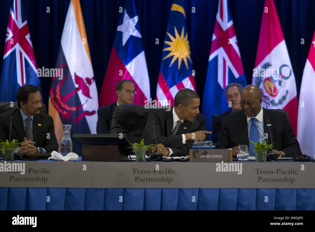 United States President Barack Obama talks to US Trade Representative Ron Kirk as he meets with Trans-Pacific Partnership leaders at the Hale Koa Hotel in Honolulu, Hawaii on Saturday, November 12, 2011..Credit: Kent Nishimura / Pool via CNP Stock Photo