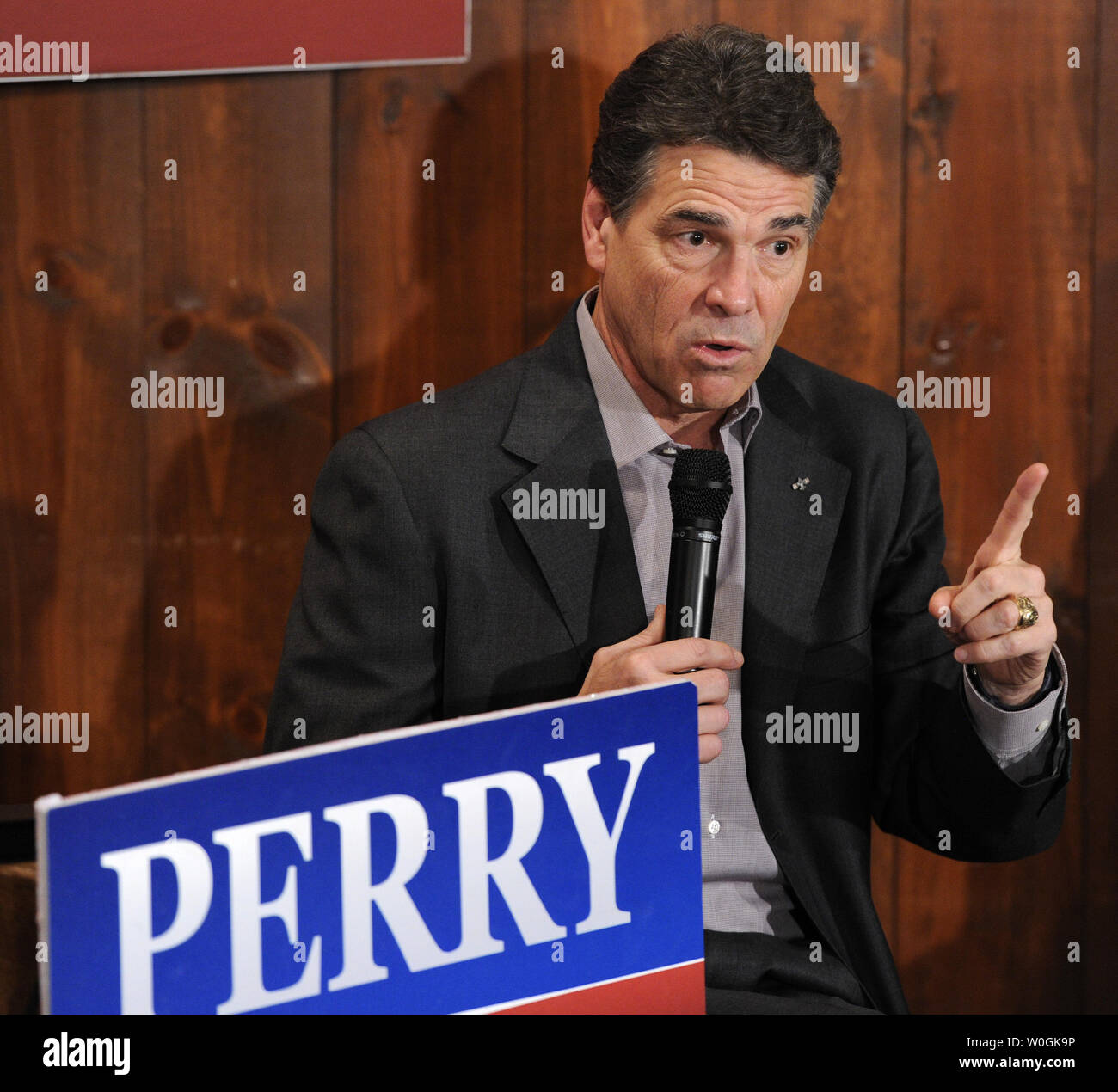 Republican 2012 presidential candidate and Texas Gov. Rick Perry responds to a question from a supporter during a campaign stop at The Fainting Goat Bar and Grill in Waverly, Iowa, December 30, 2011, in advance of Iowa's first-in-the-nation caucuses, January 3, 2012.    UPI/Mike Theiler Stock Photo