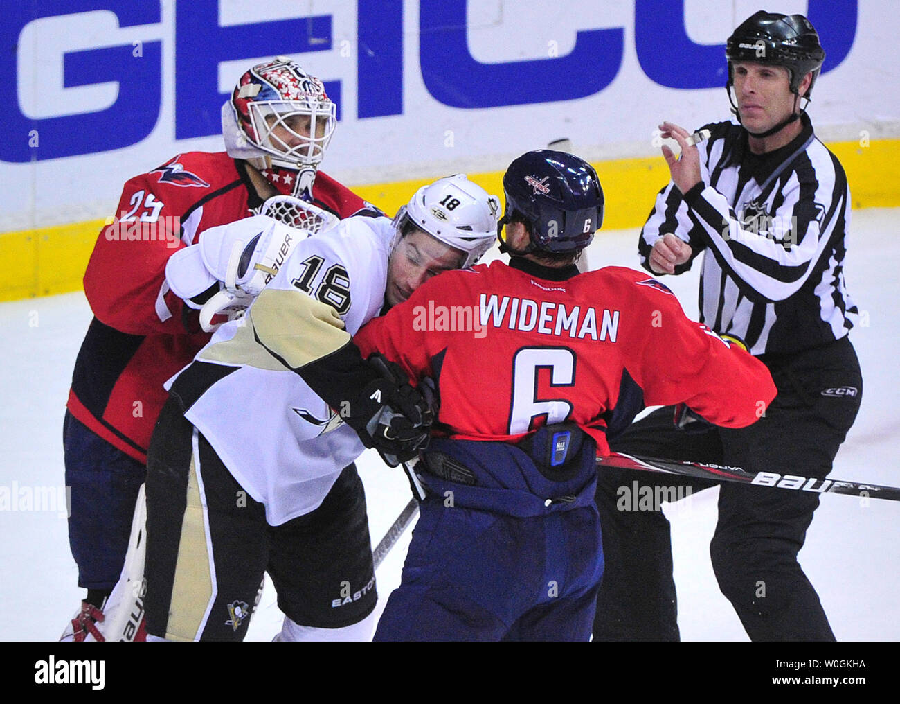 Washington Capitals' goalie Tomas Vokoun pushes Pittsburgh Penguins