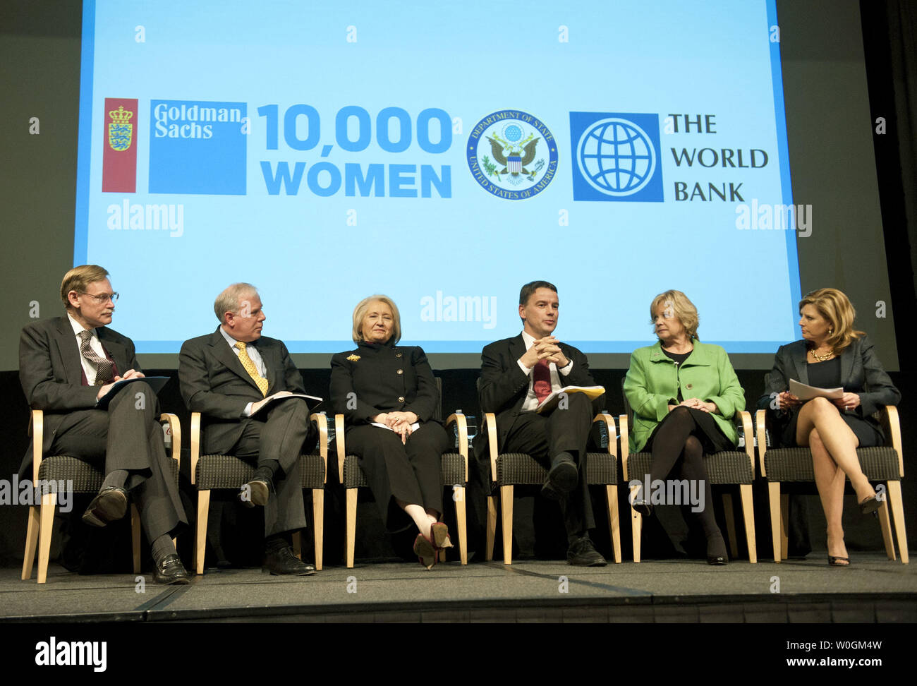 Left to right, Robert Zoellick, president of the World Bank Group, John  Rogers, chairman of the Goldman Sachs Foundation, Melanne Verveer,  ambassador-at-large for Global Women's Issues at the State Department,  Christian Friis