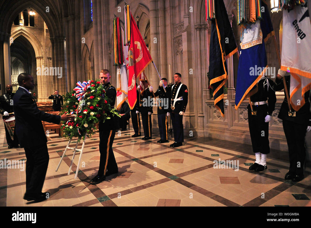 Air Force Major General Darren W. McDew (L), Commander of the Air Force District of Washington, participates in a Wreath Laying Ceremony with members of an Army Honor Guard for the 156 anniversary of President Woodrow Wilson birth at his tomb at the Washington National Cathedral in Washington on December 28, 2011. UPI/Kevin Dietsch Stock Photo
