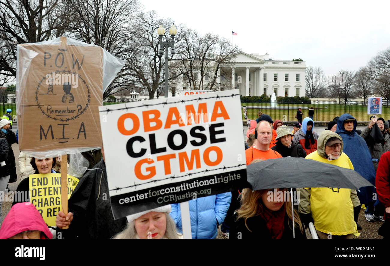 Protesters mark the 10th anniversary of the opening the Guantanamo Bay Detention Camp, in front of the White House in Washington, DC on January 11, 2012.   Human-rights groups worldwide are demanding the camp be closed.  Of the nearly 800 detainees taken to Guantanamo, 171 prisoners remain.  UPI/Pat Benic Stock Photo