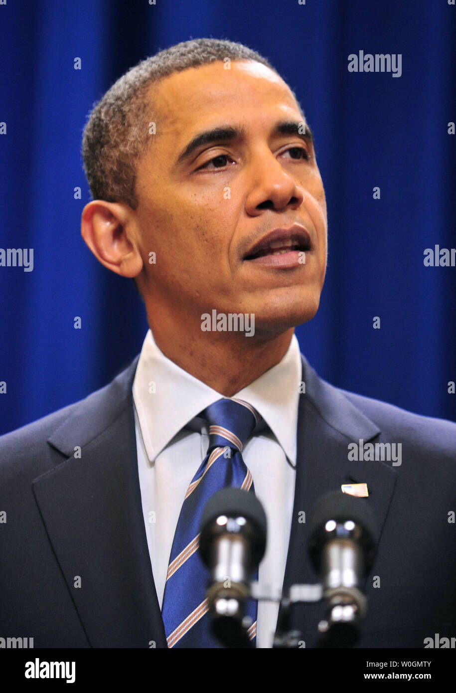 President Barack Obama speaks about the details of a $26 billion housing settlement between federal and state officials and mortgage lenders, in the Eisenhower Executive Office Building in Washington, DC on February 6, 2012. The $26 billion agreement settles potential charges of improper forecloses and mortgage fraud. UPI/Kevin Dietsch Stock Photo