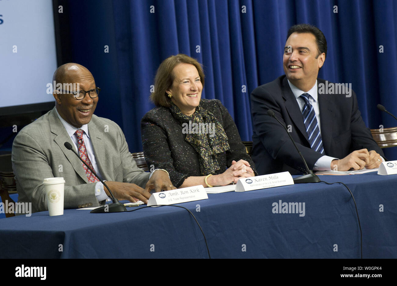 Ambassador Ron Kirk (L), U.S. Trade Representative, Karen Mills (C), Administrator of the U.S. Small Business Administration, and Michael Camunez, Assistant Secretary of Commerce for Market Access and Compliance at the U.S. Department of Commerce, participate in a round table discussion during the Conference on Connecting the Americas in the Eisenhower Executive Office Building in Washington, D.C. on April 12, 2012.  The conference focused on expanding trade between the Americas in Advance of President Obama's Participation in 6th Summit of the Americas.  UPI/Kevin Dietsch Stock Photo