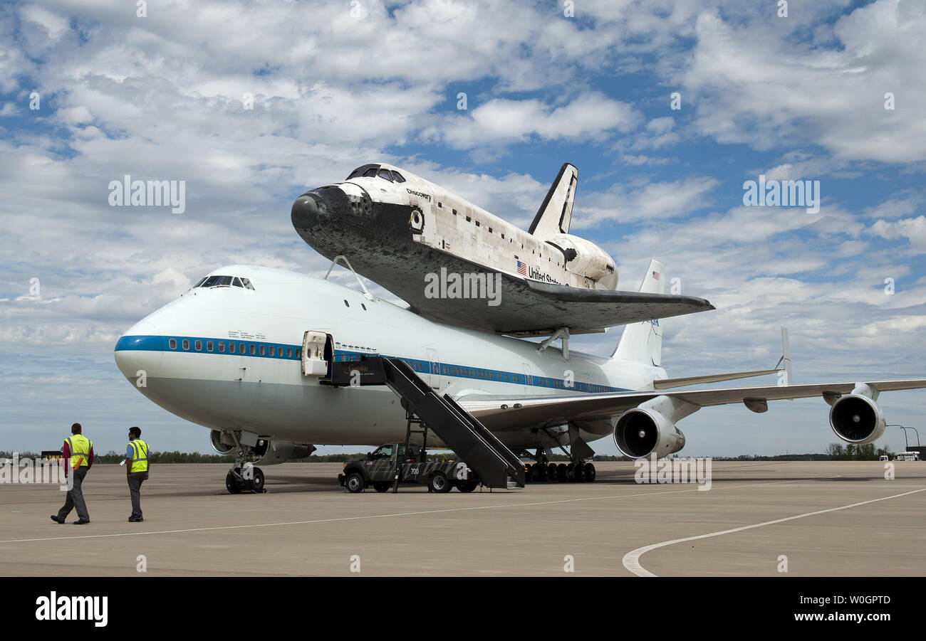 The Space Shuttle Discovery sits on top of NASA's 747 shuttle carrier aircraft after it landed at Dulles International Airport in Chantilly, Virginia on April 17, 2012.  Discovery, which ended it's last mission on March 9, 2011, is being put on permanent display at the Smithsonian's National Air and Space Museum's Udvar-Hazy Center in Chantilly, Virginia.  UPI/Kevin Dietsch. Stock Photo