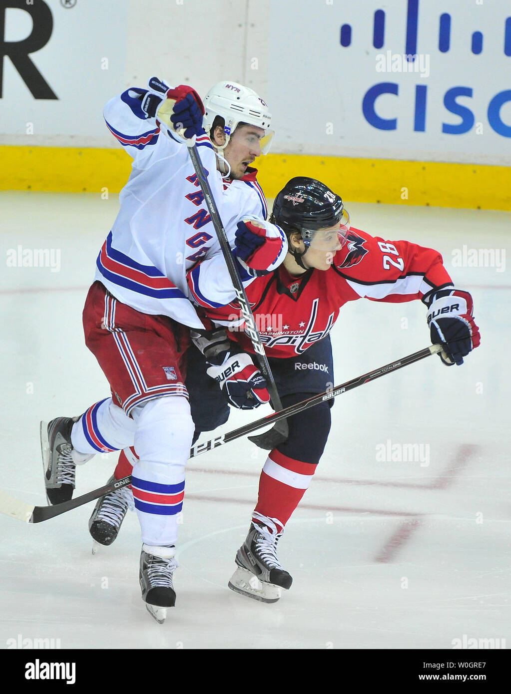 New York Rangers Derek Stepan and Washington Capitals Alexander Semin fight for position during the second overtime period in game 3 of the NHL Eastern Conference Semifinals at the Verizon Center in Washington, D.C. on May 2, 2012.  UPI/Kevin Dietsch Stock Photo