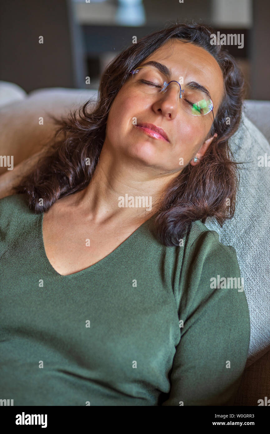 Pretty Spanish woman dreaming anything Stock Photo