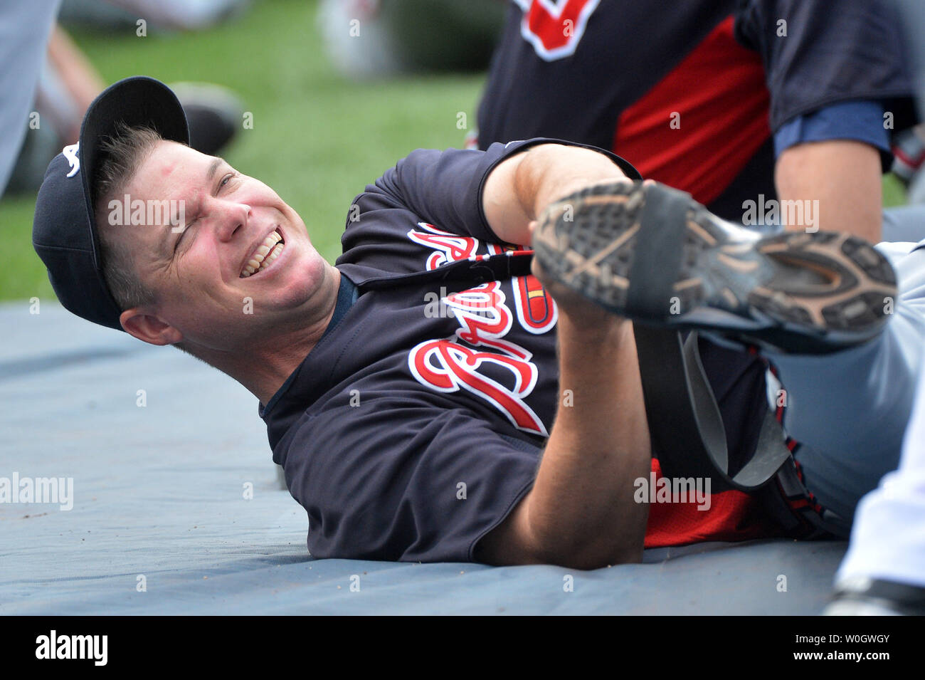Atlanta Braves Chipper Jones laughs alongside Washington Nationals
