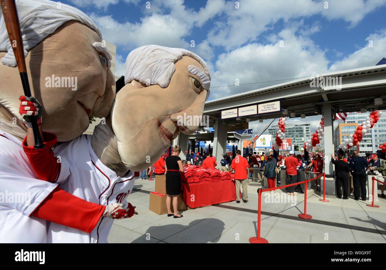 Washington Nationals mascots George Washington and Tom Jefferson entertain fans as they enter Nationals Stadium for game three of the NLDS playoff against the St. Louis Cardinals and the Washington Nationals on October 10, 2012 in Washington, DC.  This is the first playoff game in Washington since 1933.   UPI/Pat Benic Stock Photo