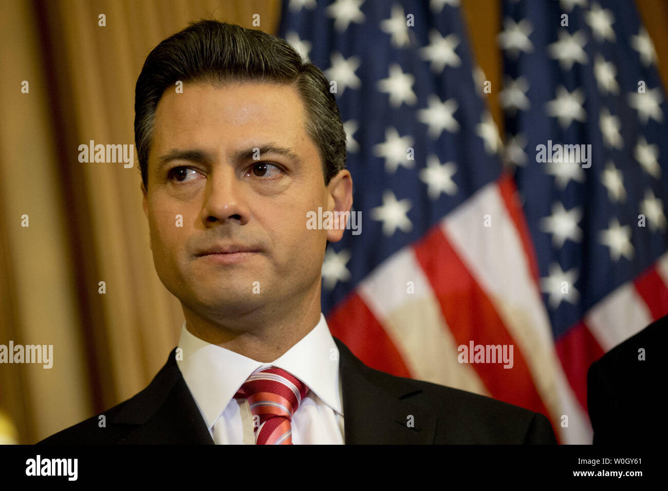 Mexican President-elect Enrique Pena Nieto is seen during a media availability with House Minority Leader Nancy Pelosi (D-CA) on Capitol Hill in Washington, DC on November 27, 2012.  UPI/Kevin Dietsch Stock Photo