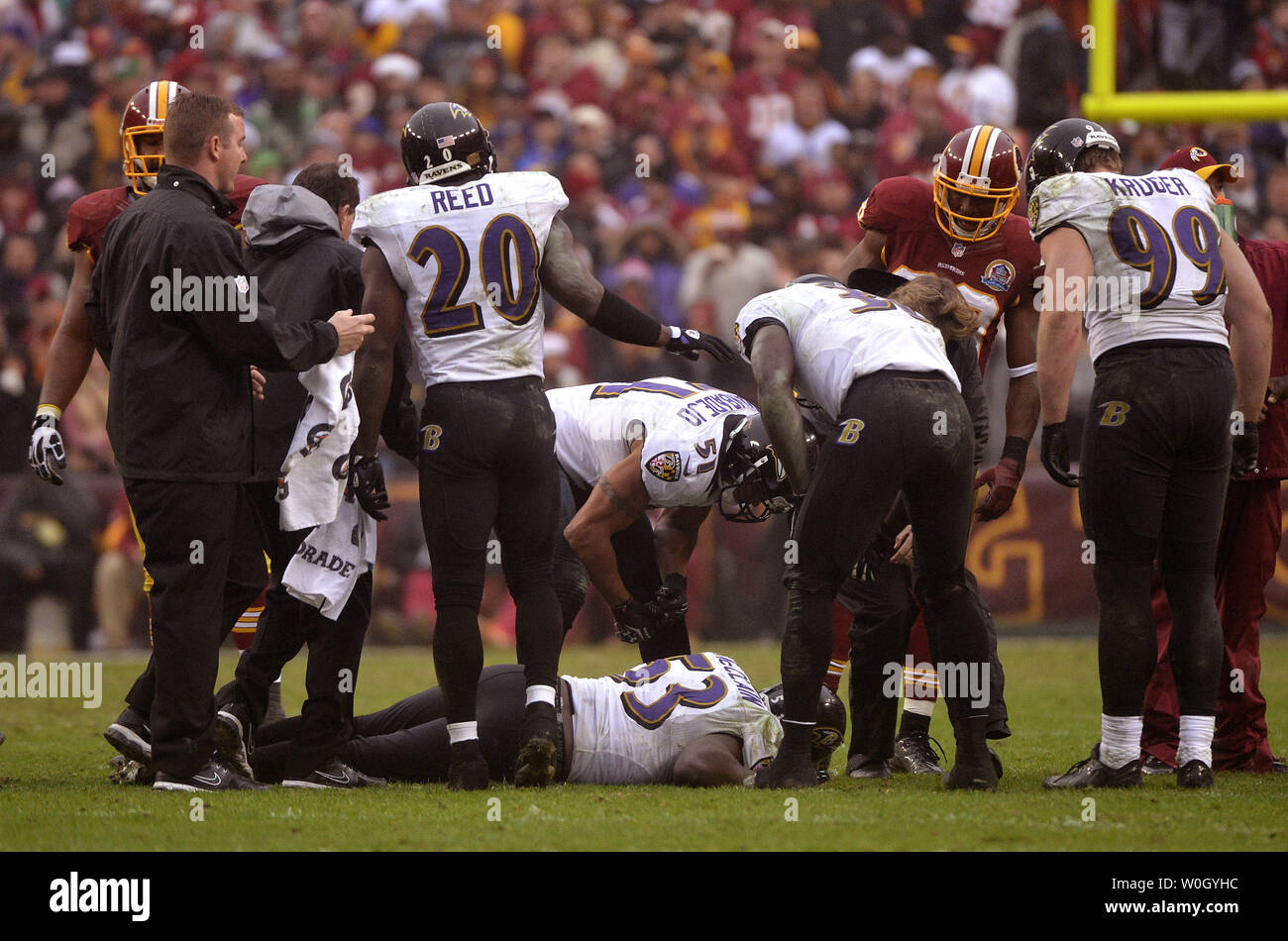 Oakland, California, USA. 3rd Jan, 2010. Baltimore Ravens linebacker Jameel  McClain #53, linebacker Ray Lewis #52, and linebacker Prescott Burgess #54  watch replay during game from the sidelines on Sunday, January 3