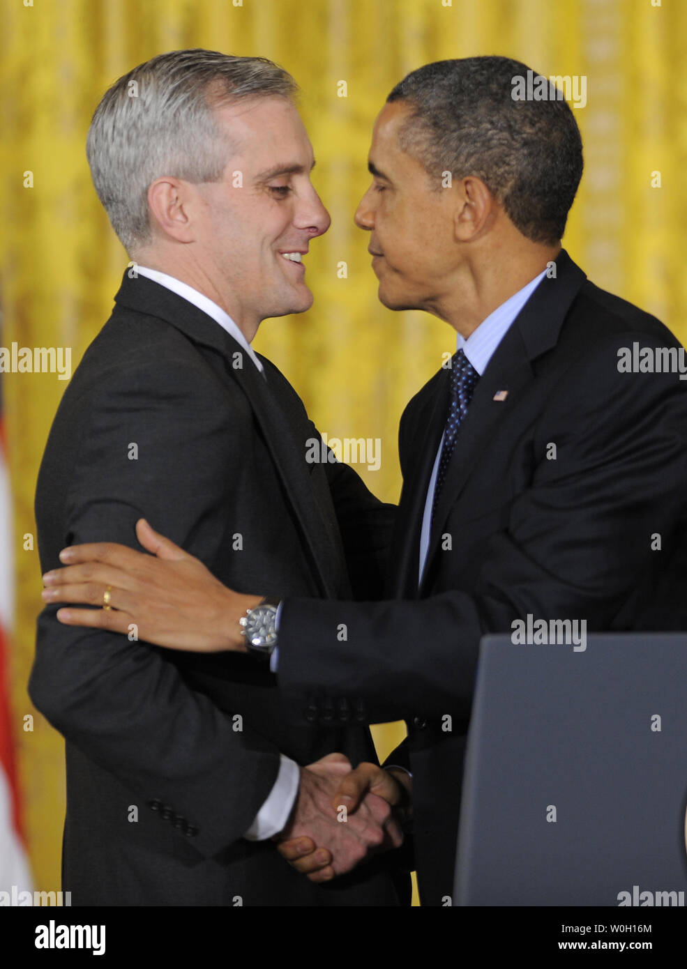 US President Barack Obama (R) shakes hands with newly-named Chief of ...