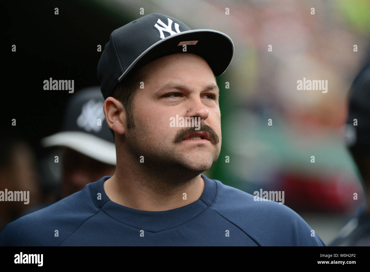 New York Yankees pitcher Joba Chamberlain is seen in the dugout as the Yankees play the Washington Nationals at Nationals Park on Mach 29, 2013 in Washington, D.C. UPI/Kevin Dietsch Stock Photo