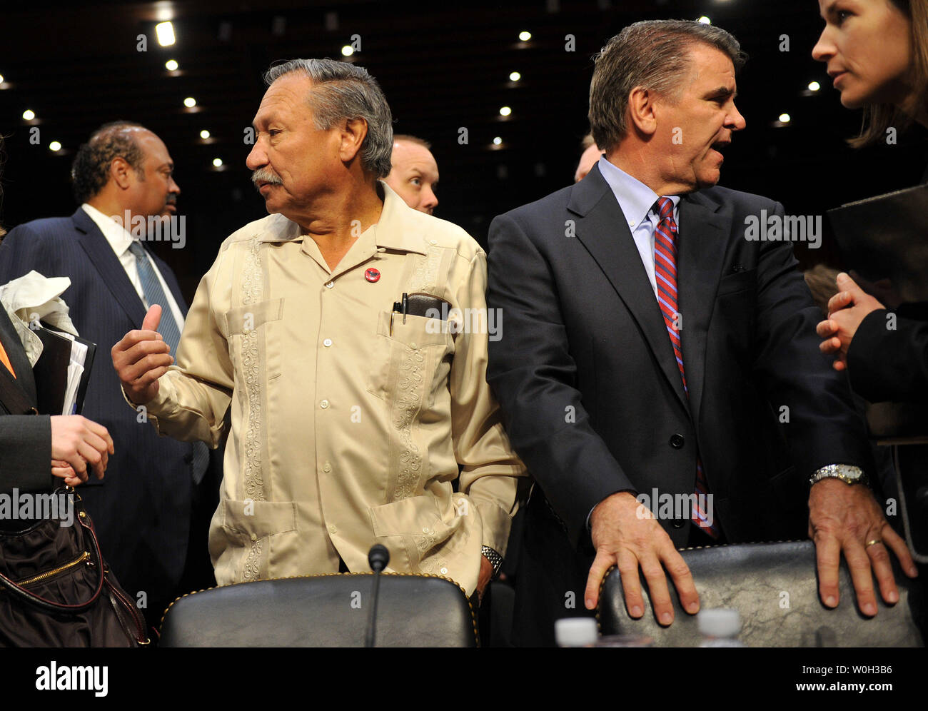 Arturo Rodriguez (L), President of the United Farm Workers, and Carles Conner, President of the National Council of Farmer Cooperatives, take their seats as they arrive for a Senate Judiciary Committee hearing on immigration reform on Capitol Hill on April 22, 2013 in Washington, D.C. UPI/Kevin Dietsch Stock Photo