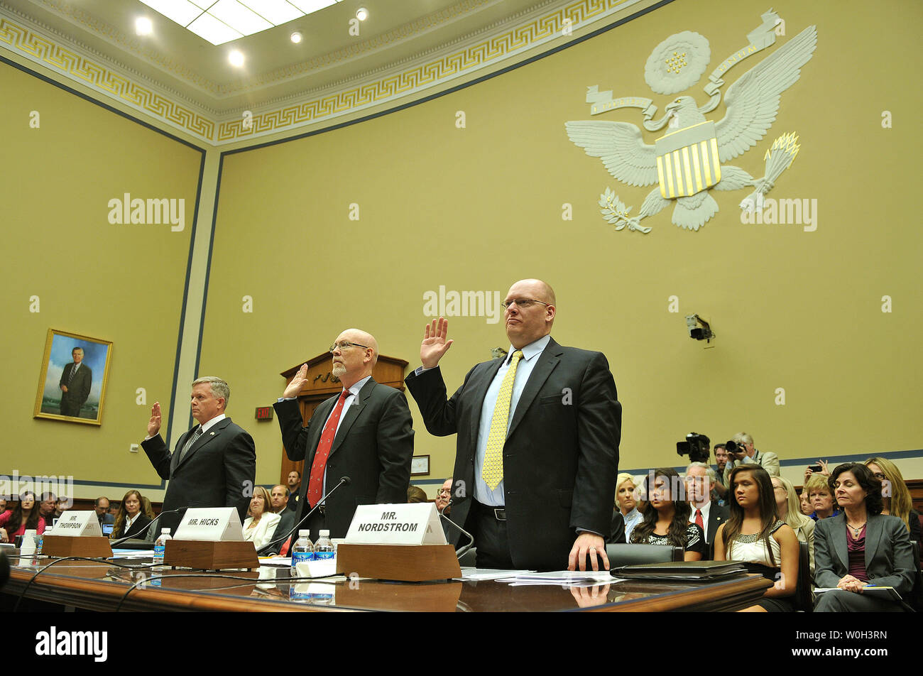From left to right, Mark Thompson, Acting Deputy Assistant Secretary for Counterterrorism at the Department of State, Gregory Hicks, Foreign Service Officer and former Deputy Chief of Mission in Libya, Eric Nordstrom, Diplomatic Security Officer and former Regional Security Officer in Libya, are sworn in prior to a House Oversight and Governmental Reform Committee hearing on the terrorist attacks on the diplomatic compound in Benghazi, on Capitol Hill on May 8, 2013 in Washington, D.C. UPI/Kevin Dietsch Stock Photo