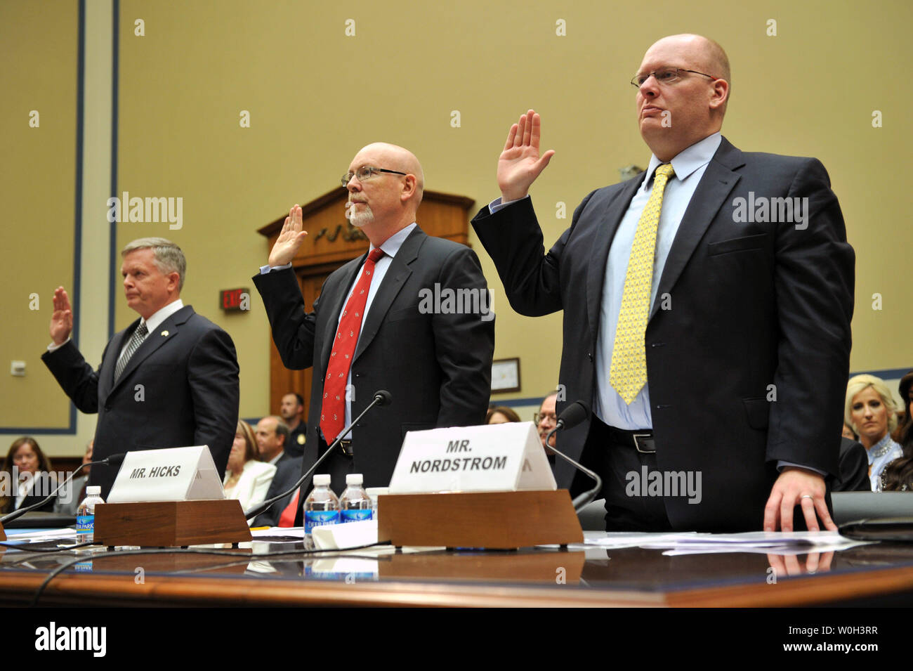 From left to right, Mark Thompson, Acting Deputy Assistant Secretary for Counterterrorism at the Department of State, Gregory Hicks, Foreign Service Officer and former Deputy Chief of Mission in Libya, Eric Nordstrom, Diplomatic Security Officer and former Regional Security Officer in Libya, are sworn in prior to a House Oversight and Governmental Reform Committee hearing on the terrorist attacks on the diplomatic compound in Benghazi, on Capitol Hill on May 8, 2013 in Washington, D.C. UPI/Kevin Dietsch Stock Photo