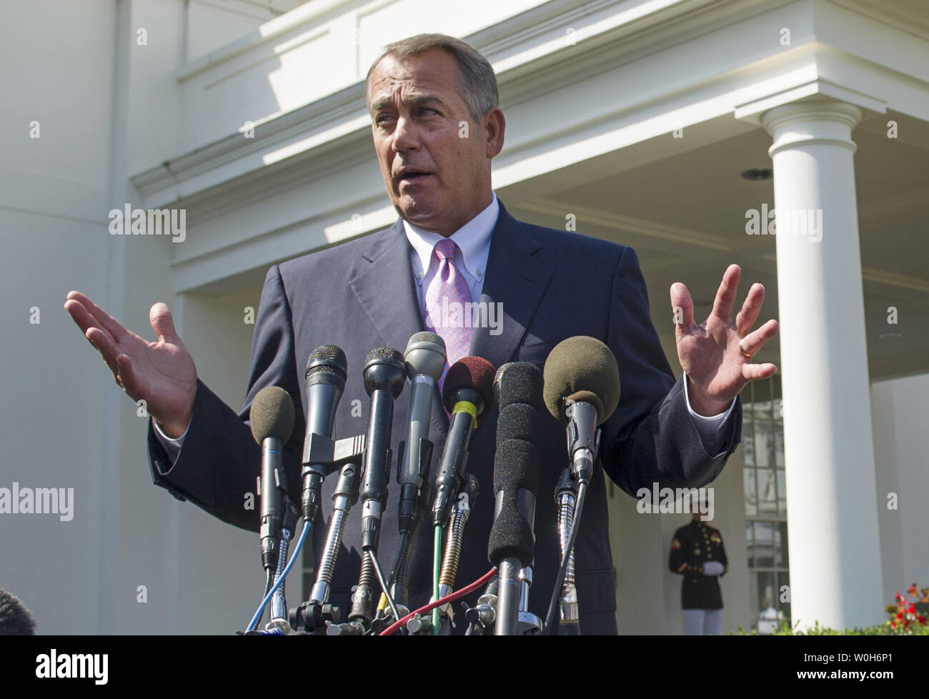 Speaker of the House John Boehner (R-OH) speaks to the media following a meeting with President Barack Obama on military action in Syria, at the White House in Washington, D.C. on September 3, 2013. Obama is weighing the use of military force in reaction to the allegations that the Assad regime used chemical weapons on rebels.  UPI/Kevin Dietsch Stock Photo