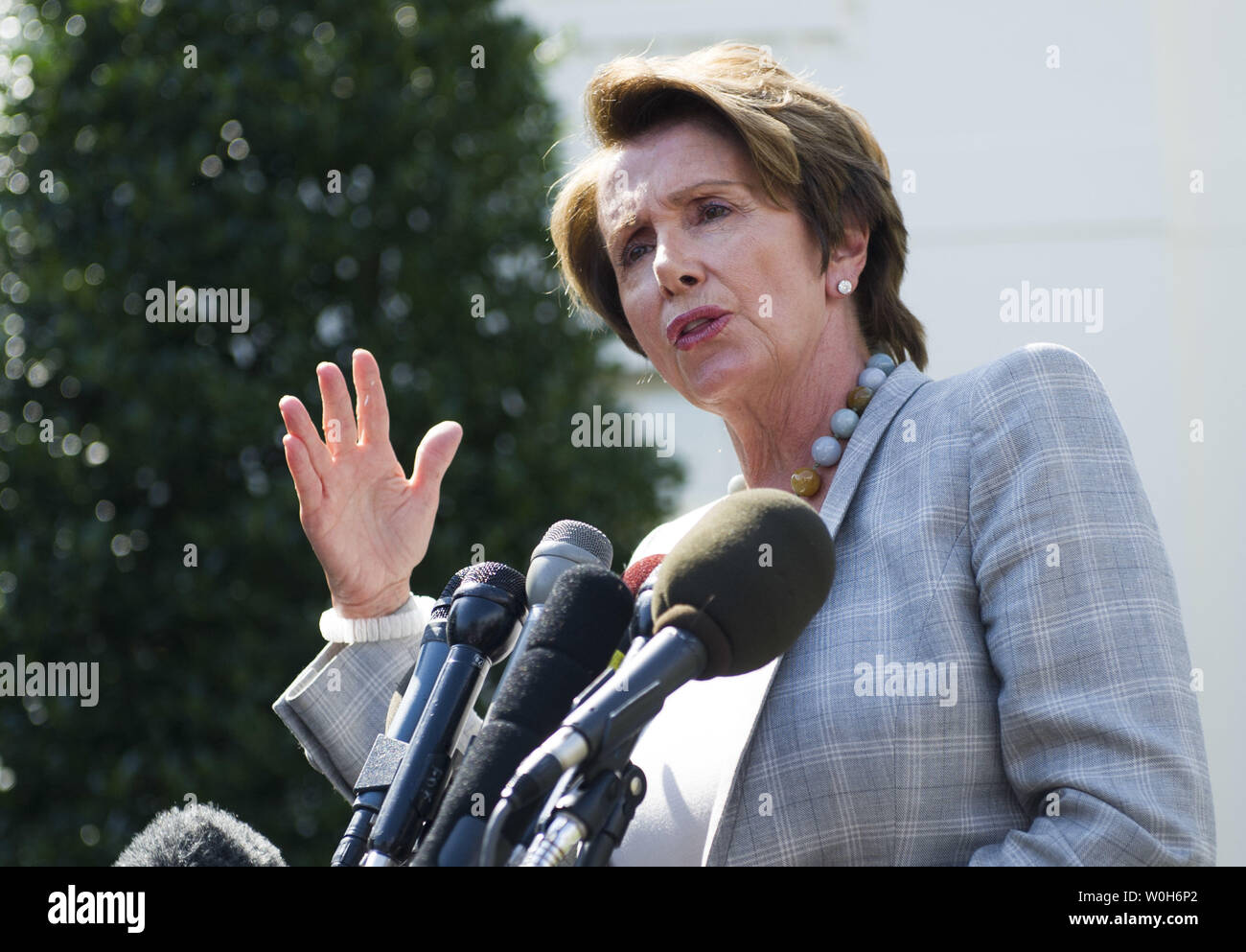 House Democratic Leader Nancy Pelosi (D-CA) speaks to the media following a meeting with President Barack Obama on military action in Syria, at the White House in Washington, D.C. on September 3, 2013. Obama is weighing the use of military force in reaction to the allegations that the Assad regime used chemical weapons on rebels.  UPI/Kevin Dietsch Stock Photo