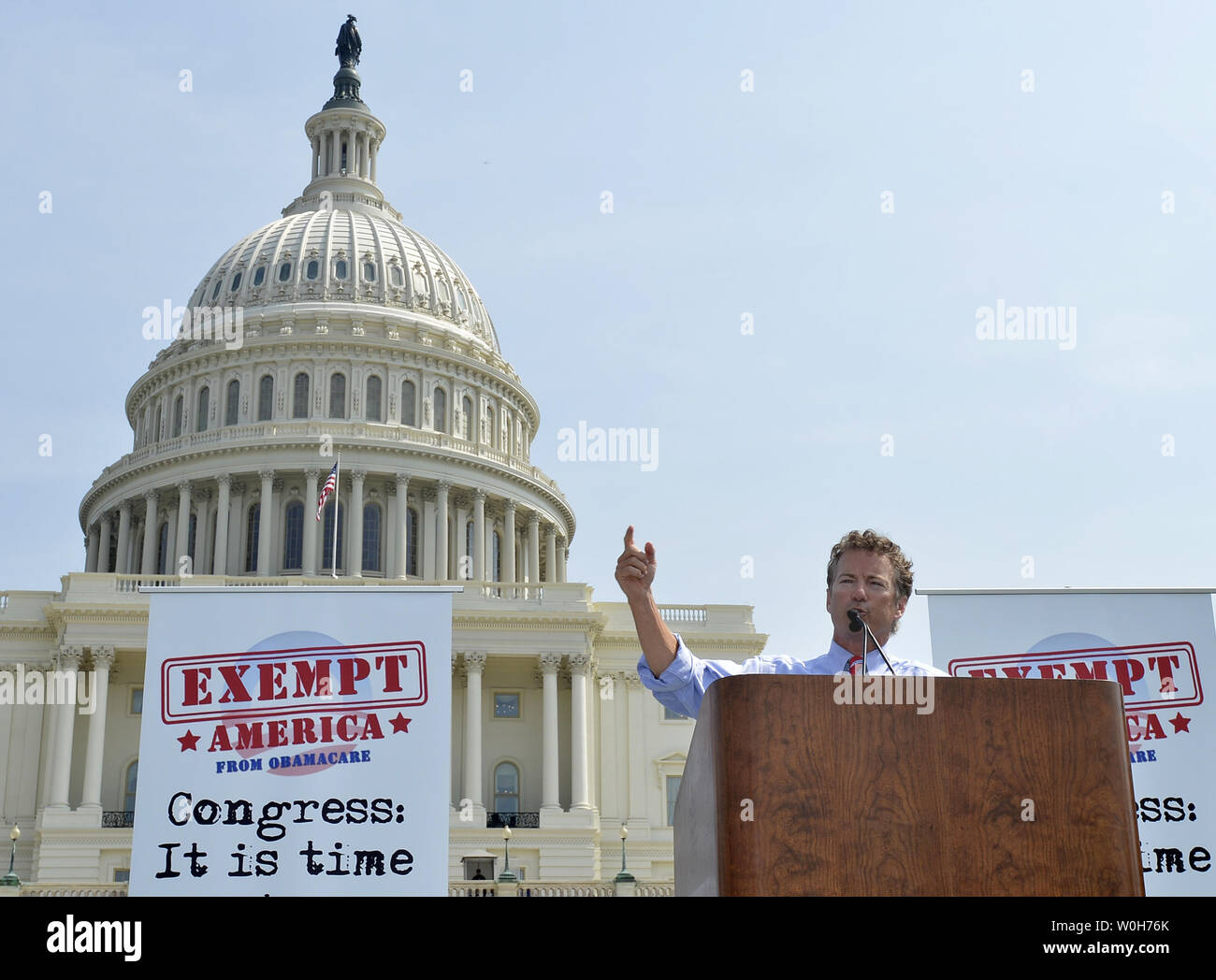 Sen. Rand Paul (R-KY) makes remarks in front of the US Capitol at a Tea Party rally to push for de-funding Obamacare, The Affordable Care Act, on Capitol Hill, September 10, 2013, in Washington, DC.  Unable to override votes to defeat President Barack Obama's health care act, some Congressional Republicans are hoping to end funding for it.                 UPI/Mike Theiler Stock Photo