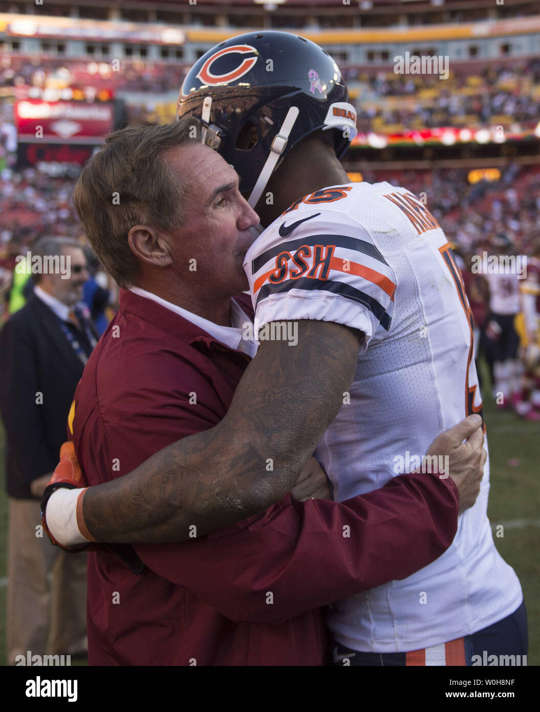 Chicago Bears receiver Brandon Marshall (15) celebrates after crossing the  goal line to cap a 31 yard touchdown pass from Chicago Bears quarterback  Jay Cutler at Cowboy's Stadium in Arlington, Texas on