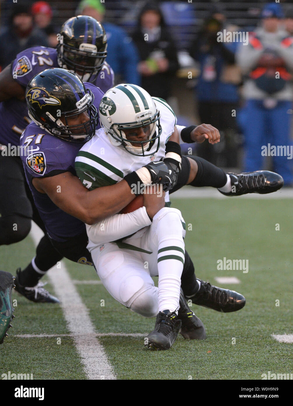 New England Patriots quarterback Tom Brady is sacked by Baltimore Ravens  Daryl Smith (51) in the second quarter at M&T Bank Stadium in Baltimore,  Maryland, December 22, 2013. UPI/Kevin Dietsch Stock Photo - Alamy