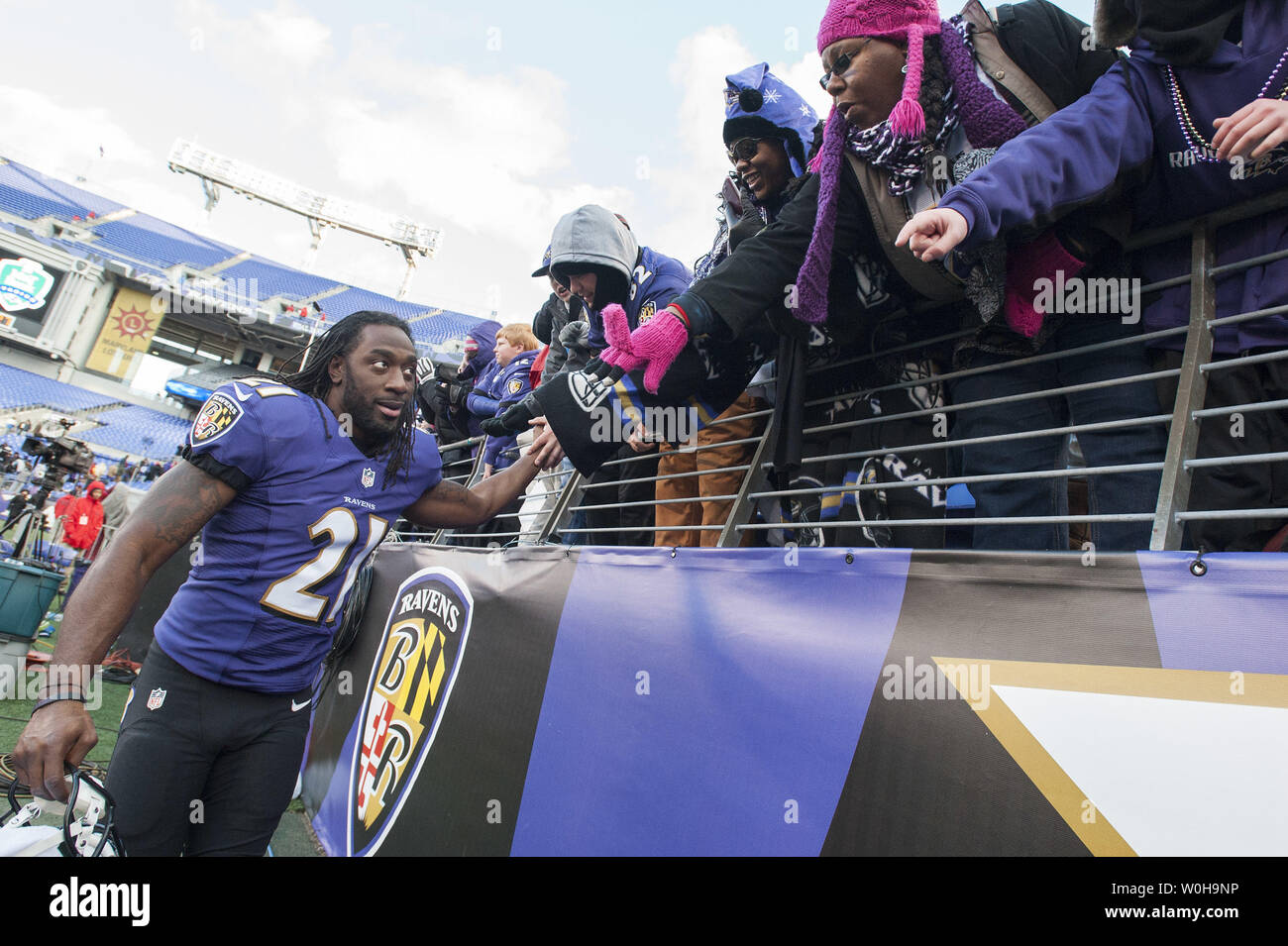 Baltimore Ravens cornerback Lardarius Webb celebrates with fans after the Ravens defeated the New York Jets 19-3, at M&T Bank Stadium in Baltimore, Maryland on November 24, 2013. UPI/Kevin Dietsch Stock Photo