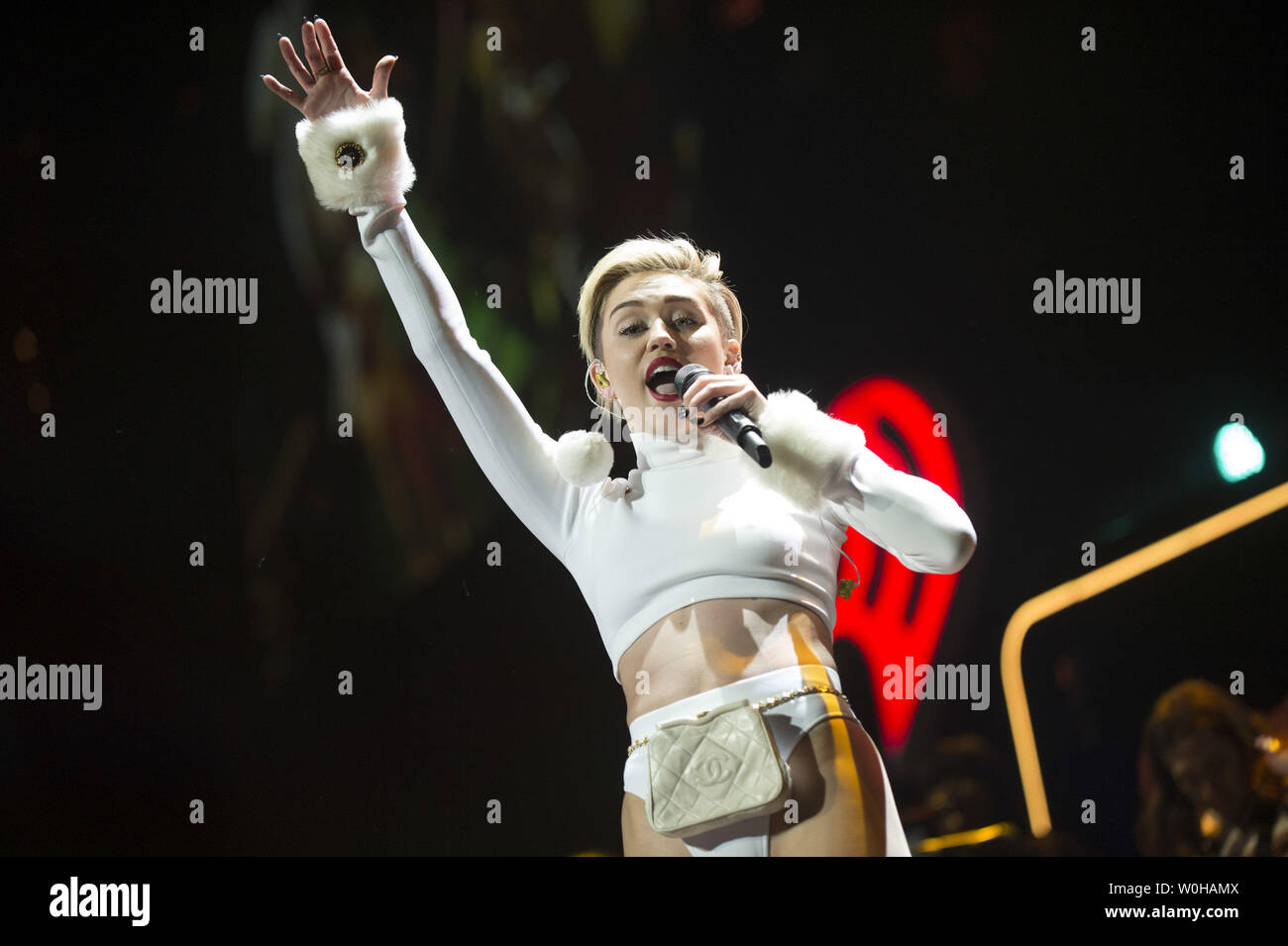 Miley Cyrus performs during the Hot 99.5 Jingle Ball concert at the Verizon Center in Washington, D.C. on December 16, 2013.  UPI/Kevin Dietsch Stock Photo