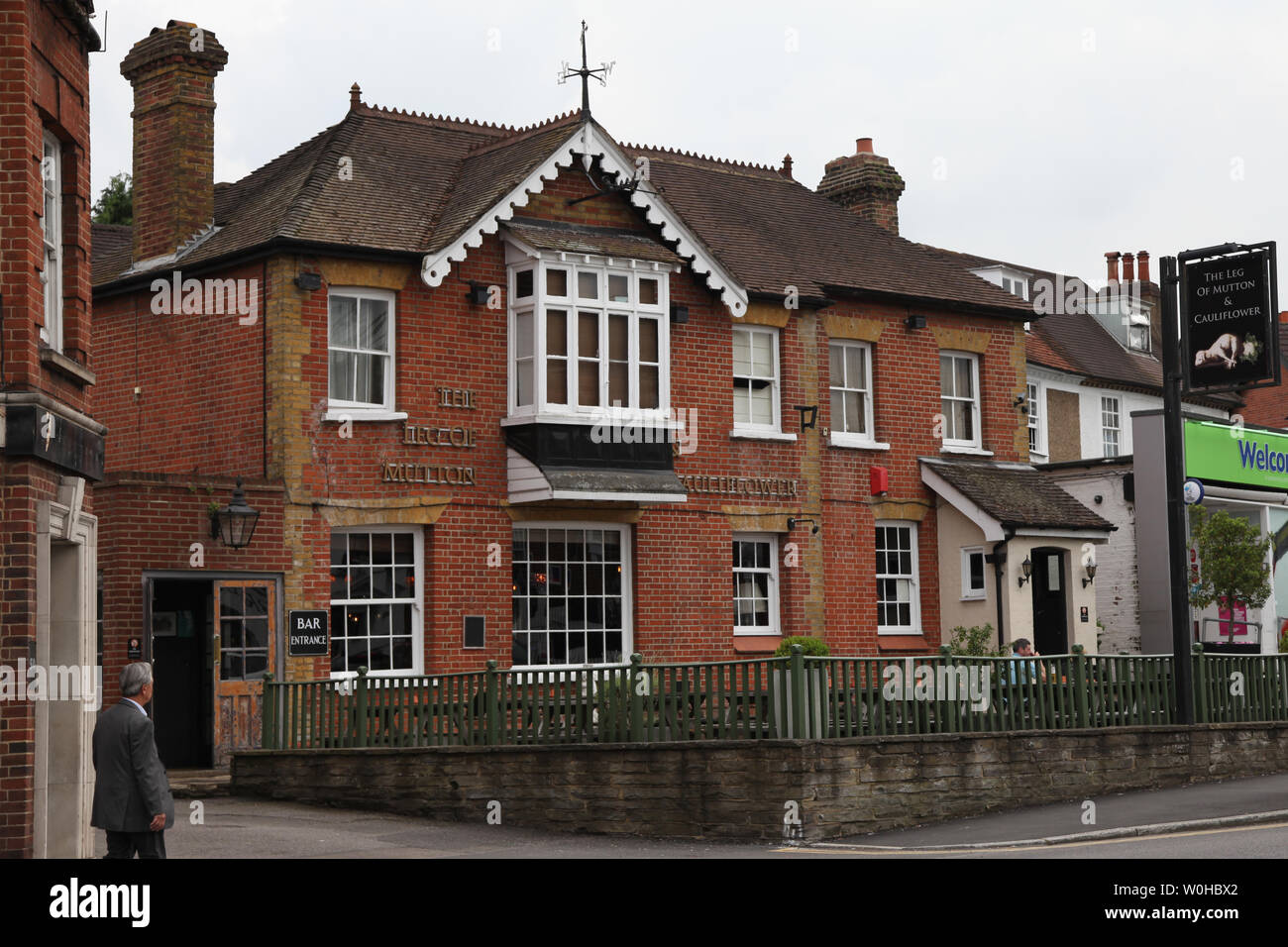 Ashtead, Surrey, UK - The Leg of Mutton and Cauliflower public house. A strange named high street village pub, locally known as the LOMAC in daytime Stock Photo