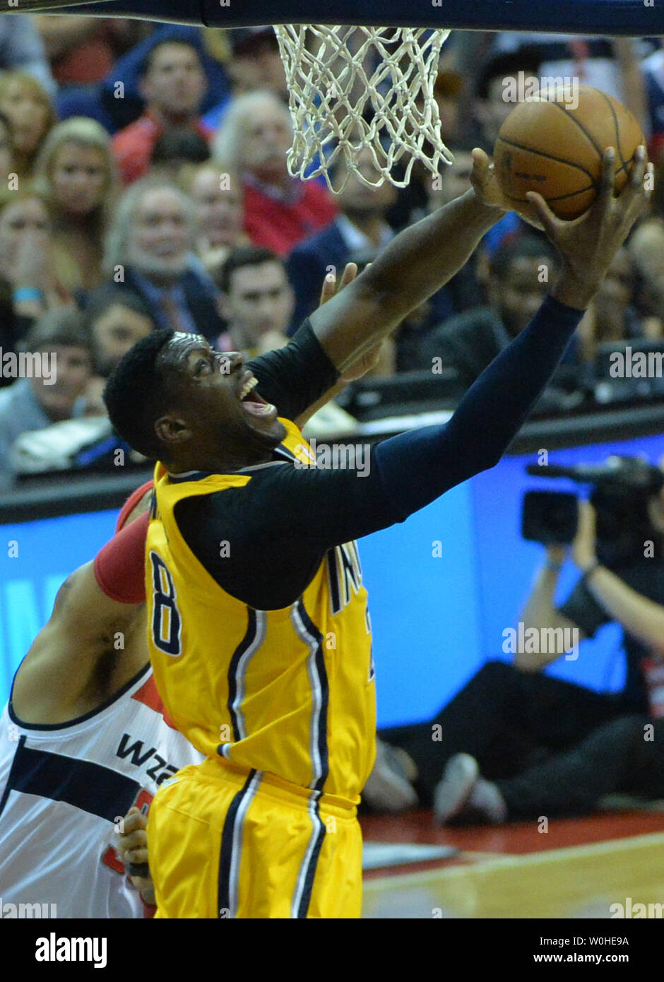 Indiana Pacers center Ian Mahinmi (28) drives to the basket against the Washington Wizards during the 1st half of game six of the Eastern Conference Semifinals at the Verizon Center in Washington, D.C. on May 15, 2014. UPI/Kevin Dietsch Stock Photo