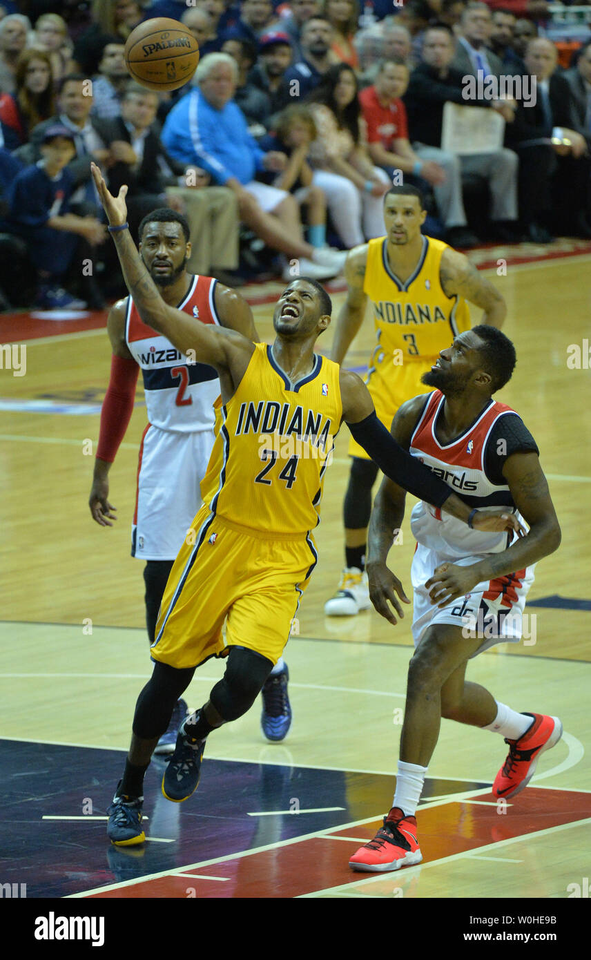 Indiana Pacers forward Paul George (24) loses control of the ball as Washington Wizards guard Bradley Beal (3) could him during the 1st half of game six of the Eastern Conference Semifinals at the Verizon Center in Washington, D.C. on May 15, 2014. UPI/Kevin Dietsch Stock Photo