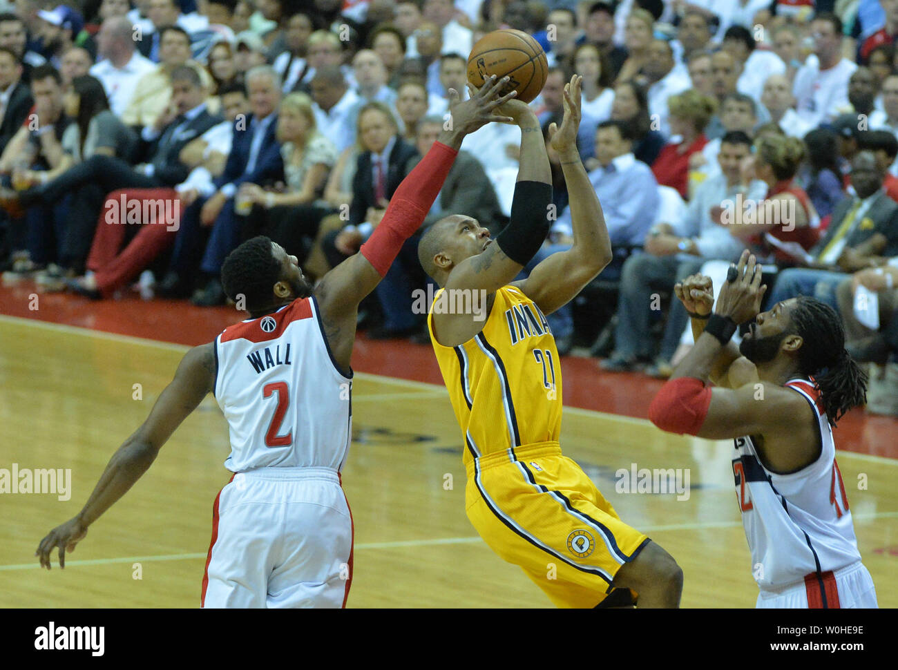 Washington Wizards guard John Wall (2) steals the ball from Indiana Pacers forward David West (21) during the 1st half of game six of the Eastern Conference Semifinals at the Verizon Center in Washington, D.C. on May 15, 2014. UPI/Kevin Dietsch Stock Photo