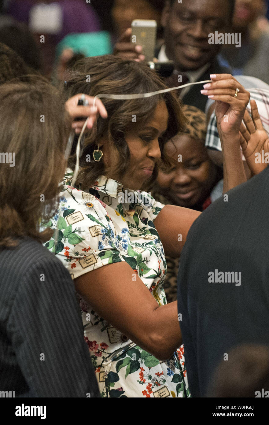 First Lady Secret Service Secret Service agents keep a close watch as an aide helps U.S. First ...