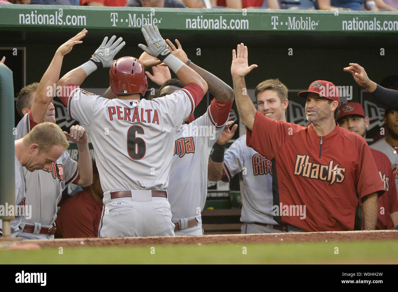 St Louis, USA . 01st May, 2022. Arizona Diamondbacks Jordan Luplow (8) is  congratulated by teammate David Peralta after hitting a solo home run in  the first inning against the St. Louis