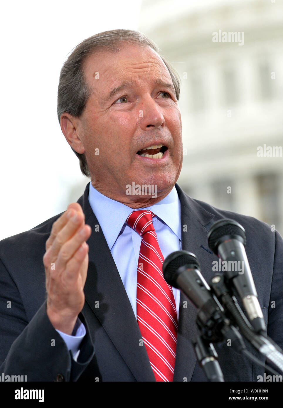 Sen. Tom Udall, D-NM, is joined by fellow Senators and Representatives as he speaks on campaign finance reform during a press conference on Capitol Hill on September 8, 2014. Udall is the co-sponsor  of bill SJ Res 19, an amendment to the constitution setting limits on campaign spending and to overturn the Citizens United Supreme Court ruling.  UPI/Kevin Dietsch Stock Photo