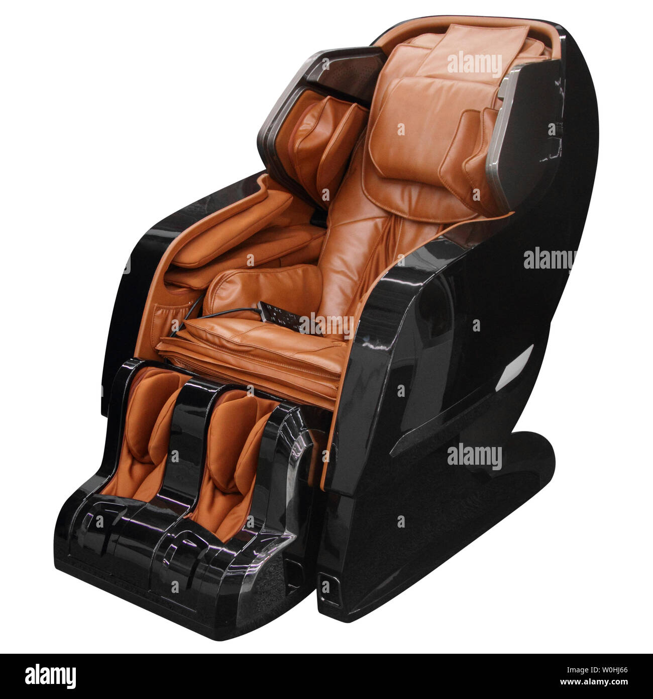 Black massage chair isolated on white background. Stock Photo