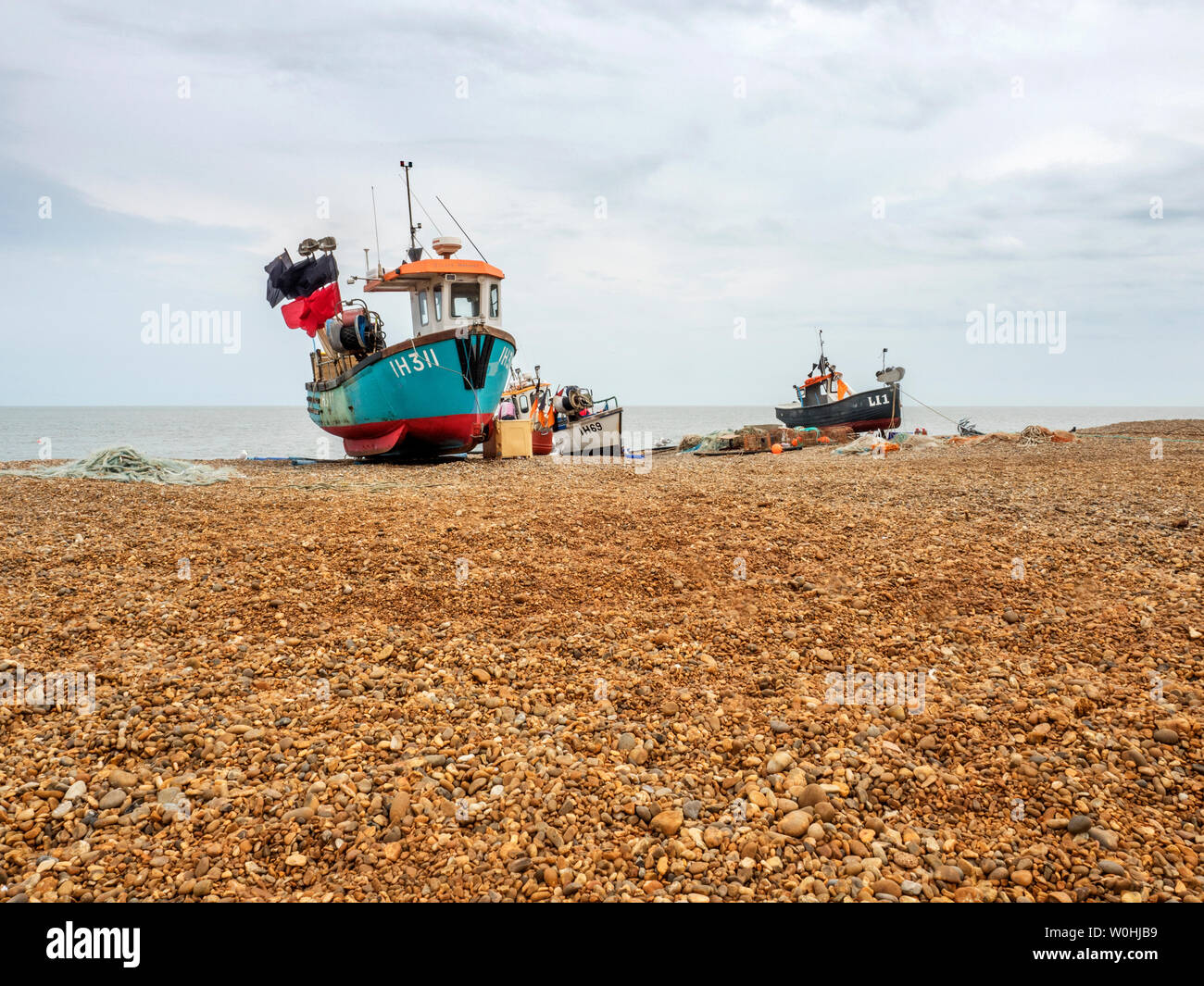 Fishing boats beached on the shingle at Aldeburgh Suffolk England Stock Photo